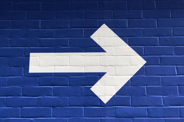 Arrow pointing right on a blue background